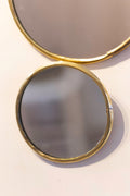 Espejo de latón dorado