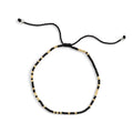 Brazalete pulsera negra oro