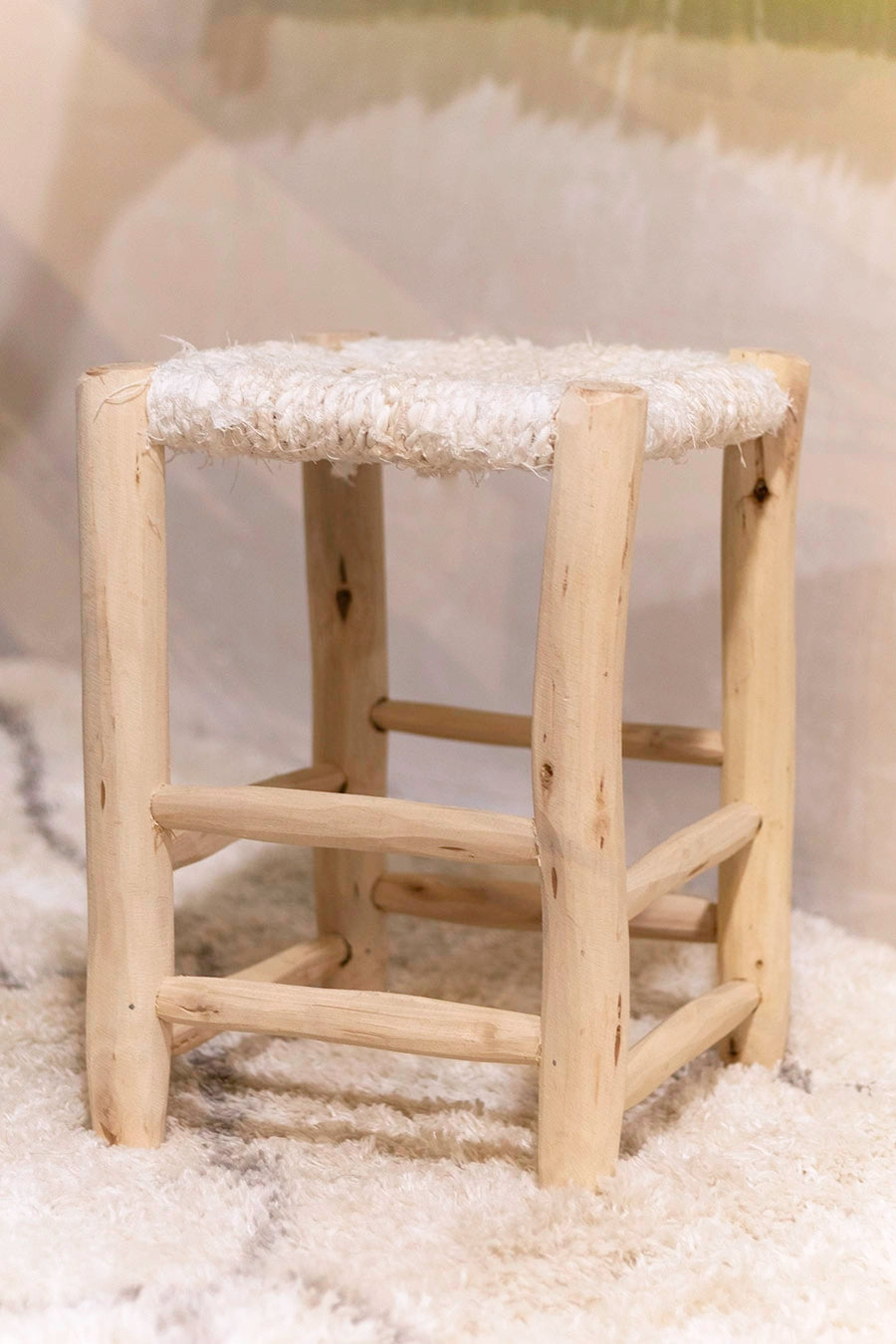 Taburete de madera y textil