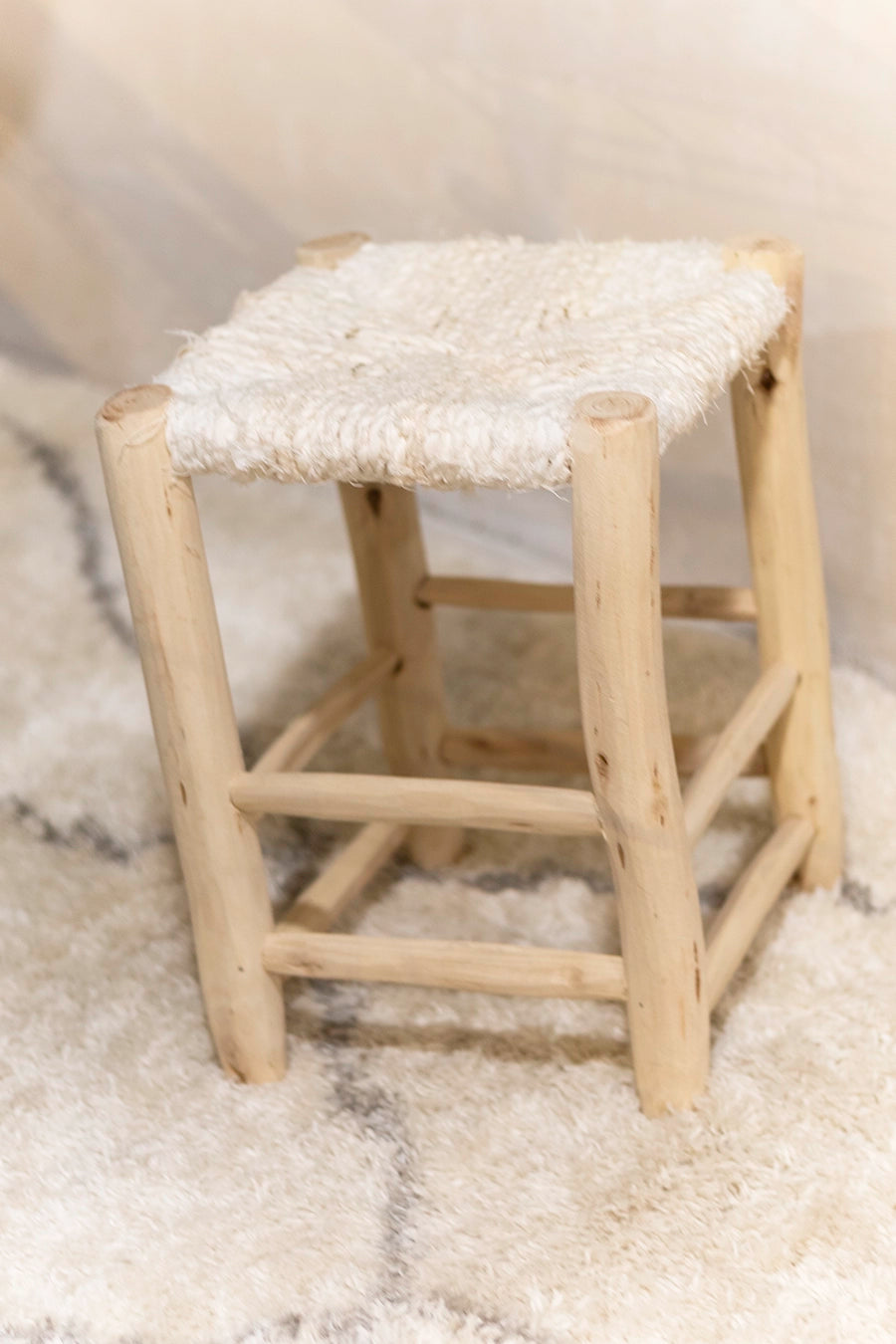 Taburete de madera y textil