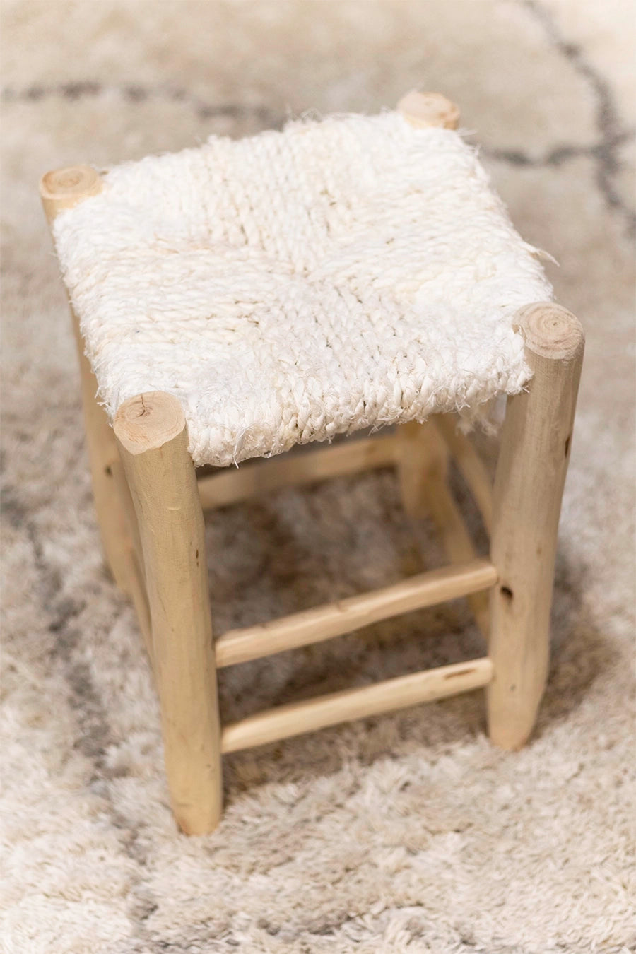 Taburete de madera y textil